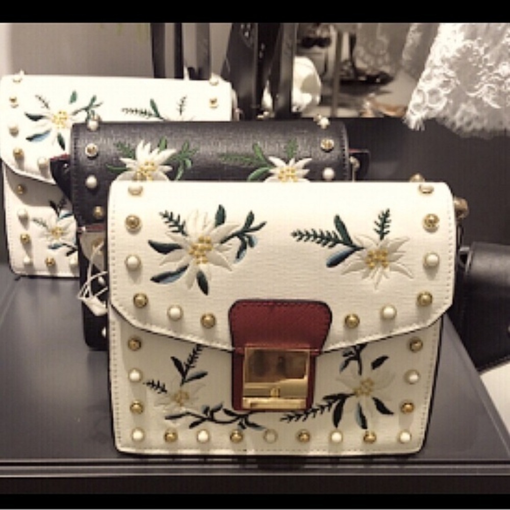 River Island w/embroidery,studs white synthetic leather bag w/short black handle